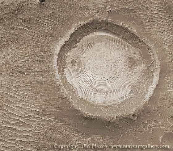 Martian sediment filled crater being eroded to reveal layers